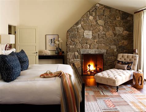 25 Bedrooms That Celebrate The Textural Brilliance Of Stone Walls