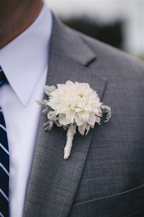 The Groomsmen Wore Simple Boutonnieres Of Large White Dahlias With