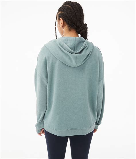 Has an updated oversized fit and half zip for layering options over your fave tights and leggings. Oversized Full-Zip Hoodie