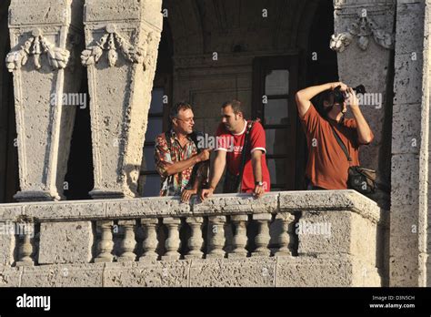 Tourists On Balcony Havana Cuba Stock Photo Alamy