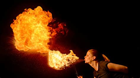 Fire Breather Blowing Fire Ball From Her Mouth Stock Photo Download