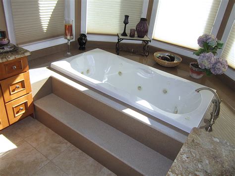 Sunken bathtubs are super trendy now. Onyx Slabs