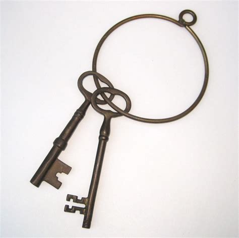 antique old brass jailers oversize key ring and two big skeleton