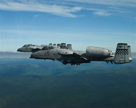 A 10 Thunderbolt Iis From The 25th Fighter Squadron Fly In Formation