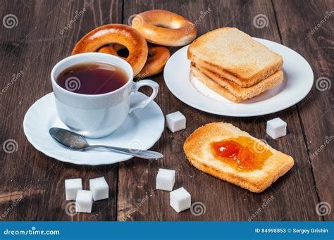 Healthy Breakfast With Cup Of Tea Bread Butter And Jam Stock Image