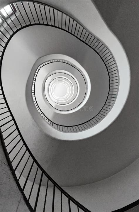 Black And White Round Spiral Staircase With Black Railings Top View
