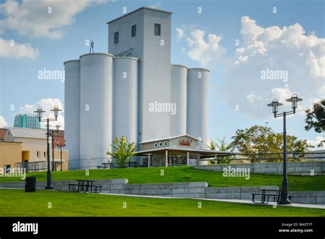 Agriculture Buildings And Vintage Grain Silos In Front Of The Sanbar