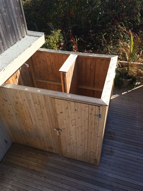 The master bathroom's outdoor shower is a natural garden escape. #outdoorshower #shower made from tongue and groove #cedar ...