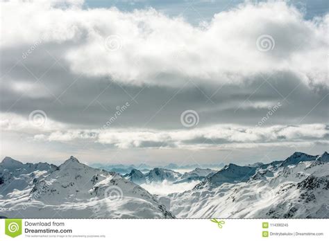 High Alpine Landscape Snow Capped Mountain Peaks On The Horizon Stock