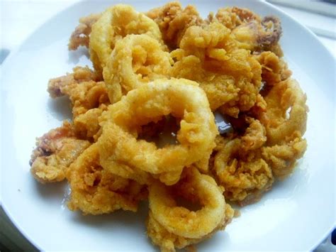 Tambahkan tepung gandum, tepung beras, serbuk kari, serbuk lada dan gula. our secret little garden: what's cookin - Sotong Goreng Tepung