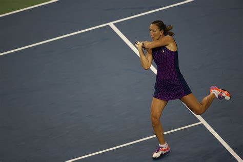When the game is eventually won, one is added to. 2008 finalist Jelena Jankovic wears a purple and blue ...