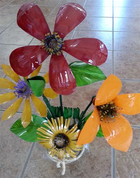 Pin By Rachel Valdez On Love Orange Plastic Bottle Flowers Plastic