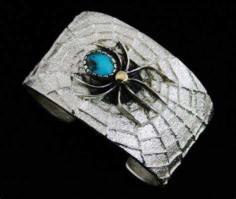 Philander Begay Bisbee Turquoise K Gold Over Tufa Cast Sterling