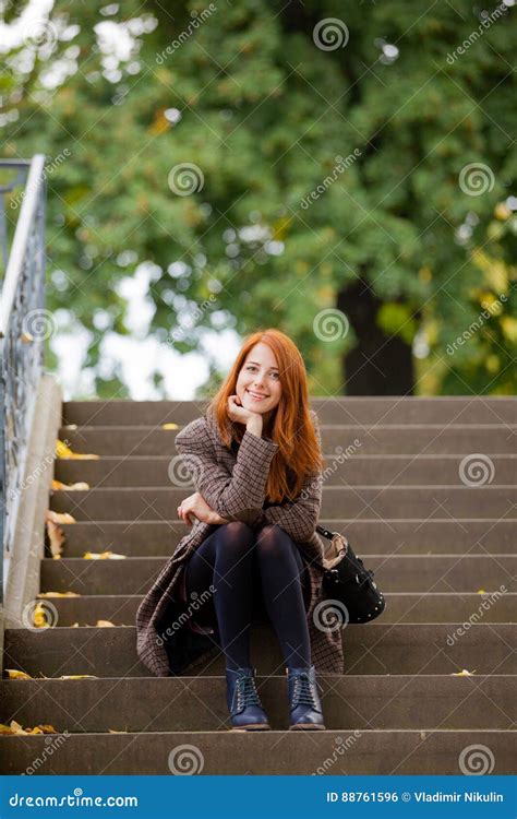 Beautiful Young Woman Sitting On The Stairs Stock Photo Image Of