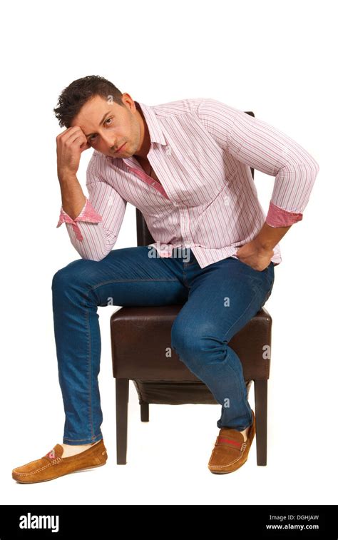 Sad Casual Man Sitting On Chair And Resting Face On Hand Isolated On