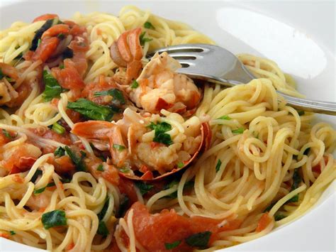 Make a shallow x incision on fresh whole tomatoes and quickly blanch in boiling water. Angel Hair Pasta with Lobster {good! omit tomatoes, chili ...