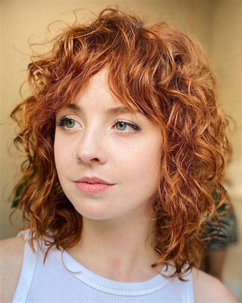 22 Best Short Curly Hair With Bangs To Try This Year Curly Shag Haircut
