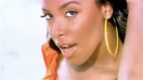 Video Screenshot Of Aaliyah Looking Naturally Beautiful From The Rock