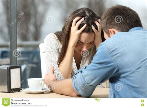 Man Comforting A Sad Depressed Girl Stock Photo Image