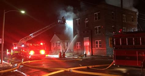 Firefighters Battle Fire At Grand Avenue Apartment Building