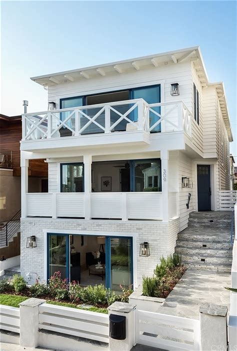 7 Coastal Home Exteriors That Will Leave You Craving The Beach