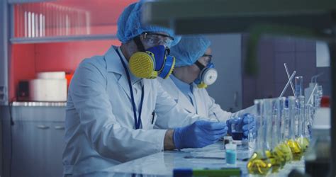 Medium Shot Of Three Scientists Working In Laboratory Stock Video