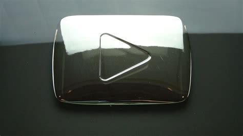 The youtube play button, now called the youtube creator awards, is a physical award given to content creators who have reached a certain number of subscribers. YOUTUBE SILVER PLAY BUTTON AWARD 100,000 SUBSCRIBERS MITCH ...