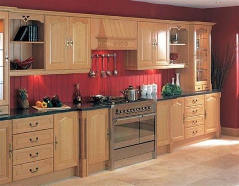 Lushome shares red kitchen designs and interesting interior decorating ideas that bring a touch of red colors into modern kitchens. Barn Red Kitchen walls | Red kitchen walls