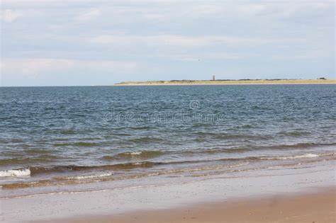 That moves across the surface of a liquid (especially across a large body of water) . Seaview stock image. Image of clouds, waves, sand ...