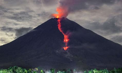 Volcanic Eruption Sparks Forest Fire On Eastern Indonesian Island