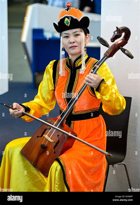 Mongolian Musician Is Playing The Horse Head Fiddle Or Morin Khuur