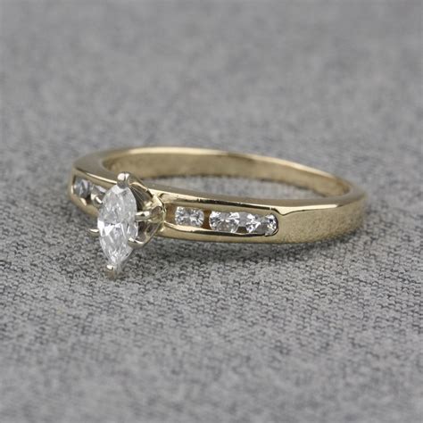 pre owned 14 karat yellow gold diamond engagement ring