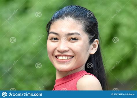 A Smiling Young Filipina Female Stock Photo Image Of Asian Youthful
