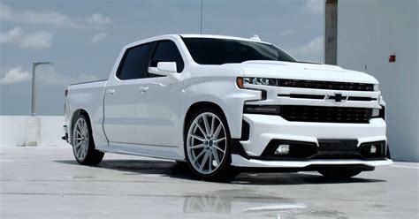 Download Stunning White Chevy Dropped Truck Wallpaper