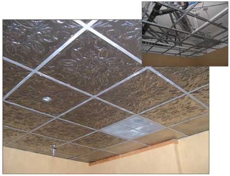 If a smooth look ceiling tile fits your décor more, try one of four ceiling tiles in the smooth look collection. suspended drop in tin ceiling look | Suspended ceiling ...