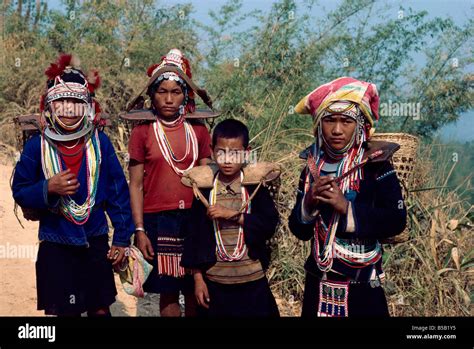 Group From The Aka Akha Hill Tribe In Traditional Dress Chiang Rai