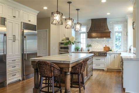 Crisp white cabinets can help any size kitchen appear larger, and complement virtually every color scheme and decor style. French Country Kitchen in Howell, MI - Mediterranean ...
