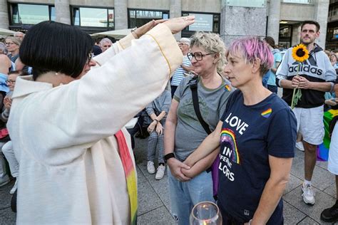 catholic priests have held a ceremony blessing same sex couples in defiance of a german archbishop