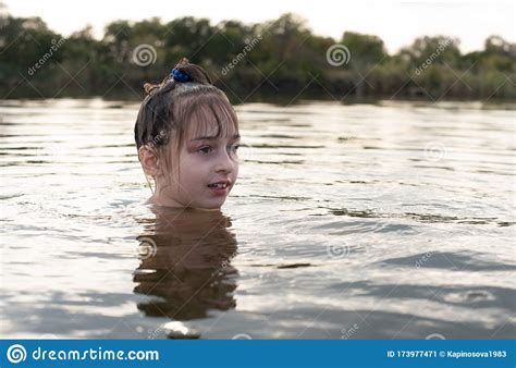 Pleasure Beautiful Little Girl Swim In Blue Water Lean Out Of Water