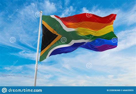 national lgbt flag of south africa flag waving in the wind at cloudy sky freedom and love