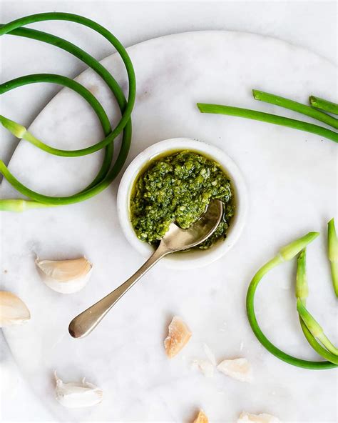 Easy Garlic Scape Pesto Recipe Nourished Kitchen