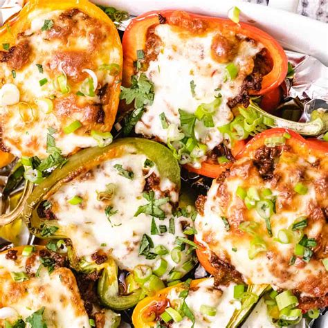 The filling is essentially sauteed garlic, shredded chicken, diced tomatoes, and taco seasoning. Keto Mexican Stuffed Peppers Recipe (Easy & Low-carb ...