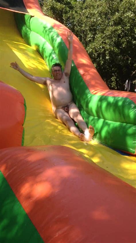 Naked Man On A Water Slide