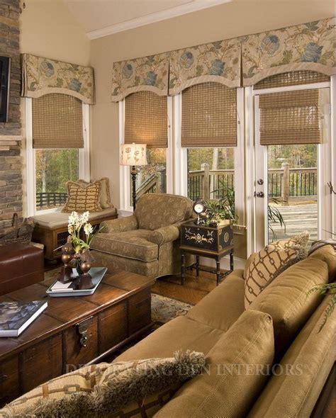 The living room is the epicentre of your home, providing a warm and welcoming space for all the family to enjoy. Valances over woven shades. Room designed by Tracy ...