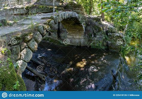 Old Stone Bridge Over A Stream In The Woods Stock Photo Image Of