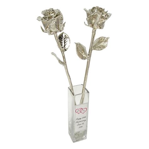 Maybe you would like to learn more about one of these? Two 20th Anniversary 18" Platinum Roses in Custom Vase ...