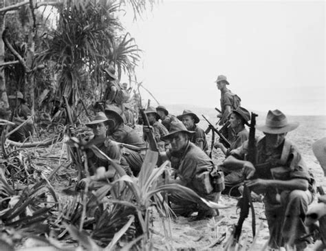 wwii new guinea australian soldiers from a company 2 11th battalion rest up on a river bank