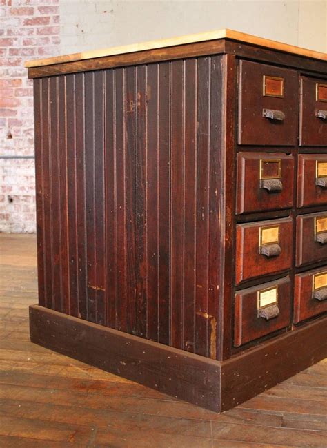 This versatile 9 drawer accent cabinet store away clutter. Apothecary Cabinet, Vintage Wooden Storage Store Counter ...