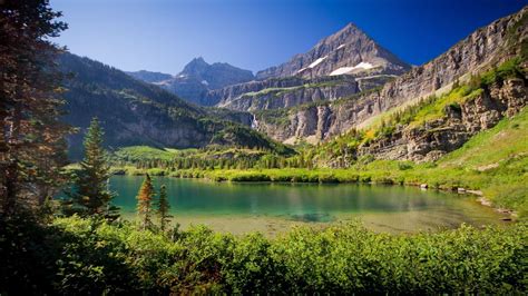 Mountains Lake Bushes Plants Grass Under Blue Sky Hd Nature Wallpapers