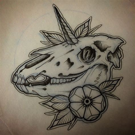Traditional Old School Unicorn Skull With A Flower Tattoo